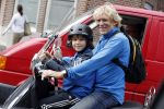 Amsterdam 2 september 2016 
Hans Jorritsma met zijn zoon op een vespa scooter