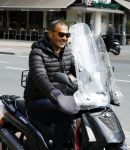 Amsterdam 10 augustus 2016
Ruud Gullit samen met zijn dochter Joelle op terras. Ruud bekijkt samen met haar zijn nieuwe boek.