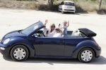 ibiza 27 juni 2016
Sonja Bakker met man Jan Reus en zoon Bram bij cala Bassa. Ze rijden in een VW kever cabrio.