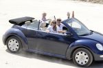 ibiza 27 juni 2016
Sonja Bakker met man Jan Reus en zoon Bram bij cala Bassa. Ze rijden in een VW kever cabrio.