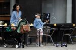 Amsterdam 9 augustus 2017  
Birgit Schuurman met zoon Chico en een kennis op terras