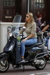 Amsterdam 3 september 2017 
Estelle Cruijff op haar vespa scooter
