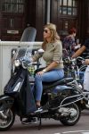 Amsterdam 3 september 2017 
Estelle Cruijff op haar vespa scooter