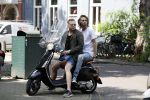 Amsterdam 21 juli 2017
Jamai Loman met zijn vriend Michael Muller op hun vespa scooter