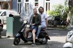 Amsterdam 21 juli 2017
Jamai Loman met zijn vriend Michael Muller op hun vespa scooter