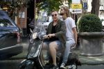Amsterdam 21 juli 2017
Jamai Loman met zijn vriend Michael Muller op hun vespa scooter