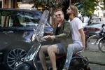 Amsterdam 21 juli 2017
Jamai Loman met zijn vriend Michael Muller op hun vespa scooter