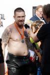 Amsterdam 3 september 2017  
ALS Cityswim in de amsterdamse grachten. Johnny de Mol jr en Rick Brandsteder zemmen met Ralph en Carlijn de Vies en hun kinderen  zoon Daniel en  hun dochter