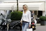 Amsterdam 15 juli 2017 
Myrthe Mylius met haar vriend Sebastian Schneberger op terras in in hun mini cabrio