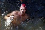 Amsterdam 3 september 2017  
ALS Cityswim in de amsterdamse grachten. Johnny de Mol jr en Rick Brandsteder zemmen met Ralph en Carlijn de Vies en hun kinderen  zoon Daniel en  hun dochter