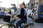 Amsterdam 15 september 2017 
Robert ten Brink op fiets met kinderzitje