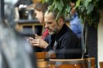 Amsterdam 12 juli 2017
Rolf Snieren op terras met zijn mobiel.