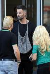 Amsterdam 3 augustus 2018
Patricia Paay en haar man Robert Hinfelaar met vriendin op het leidse plein in Amsterdam.. Arie Boomsma