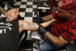 Eindhoven 28 augustus 2018
Rolf Tangel laat bij Dannyâ€™s tattooshop in Eindhoven zijn Barbie Samantha tatoos weghalen.