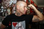 Eindhoven 28 augustus 2018
Rolf Tangel laat bij Dannyâ€™s tattooshop in Eindhoven zijn Barbie Samantha tatoos weghalen.