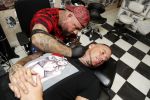 Eindhoven 28 augustus 2018
Rolf Tangel laat bij Dannyâ€™s tattooshop in Eindhoven zijn Barbie Samantha tatoos weghalen.