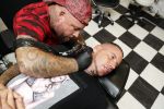 Eindhoven 28 augustus 2018
Rolf Tangel laat bij Dannyâ€™s tattooshop in Eindhoven zijn Barbie Samantha tatoos weghalen.
