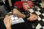 Eindhoven 28 augustus 2018
Rolf Tangel laat bij Dannyâ€™s tattooshop in Eindhoven zijn Barbie Samantha tatoos weghalen.