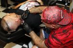 Eindhoven 28 augustus 2018
Rolf Tangel laat bij Dannyâ€™s tattooshop in Eindhoven zijn Barbie Samantha tatoos weghalen.