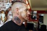 Eindhoven 28 augustus 2018
Rolf Tangel laat bij Dannyâ€™s tattooshop in Eindhoven zijn Barbie Samantha tatoos weghalen.