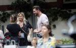 Amsterdam 28 augustus 2019
Candy Dulfer met vriend Rafael op terras en daarna op de fiets in Amsterdam.