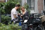 Amsterdam 28 augustus 2019
Candy Dulfer met vriend Rafael op terras en daarna op de fiets in Amsterdam.