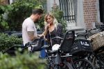 Amsterdam 28 augustus 2019
Candy Dulfer met vriend Rafael op terras en daarna op de fiets in Amsterdam.