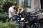 Amsterdam 28 augustus 2019
Candy Dulfer met vriend Rafael op terras en daarna op de fiets in Amsterdam.
