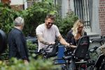 Amsterdam 28 augustus 2019
Candy Dulfer met vriend Rafael op terras en daarna op de fiets in Amsterdam.