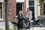 Amsterdam 28 augustus 2019
Candy Dulfer met vriend Rafael op terras en daarna op de fiets in Amsterdam.