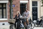 Amsterdam 28 augustus 2019
Candy Dulfer met vriend Rafael op terras en daarna op de fiets in Amsterdam.