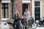 Amsterdam 28 augustus 2019
Candy Dulfer met vriend Rafael op terras en daarna op de fiets in Amsterdam.