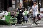 Amsterdam 28 augustus 2019
Candy Dulfer met vriend Rafael op terras en daarna op de fiets in Amsterdam.