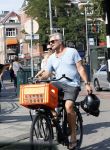 Amsterdam 31 augustus 2019
Victor Reinier met vriendin en dochter op de fiets
