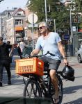 Amsterdam 31 augustus 2019
Victor Reinier met vriendin en dochter op de fiets