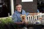 Amsterdam 23 augustus 2020
Hans v d Togt met een hondje op terras