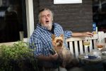 Amsterdam 23 augustus 2020
Hans v d Togt met een hondje op terras