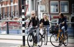 Amsterdam 13-14 en 15 augustus 2021
Art Rooijakkers op de fiets en zijn huis op de wallen