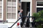 Amsterdam 1 augustus 2022
Het nieuwe huis van prinses Amalia wordt helemaal verbouwd . Er zijn nu ook veiligheids camera's opgehangen . Grachtenpand.