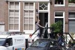 Amsterdam 1 augustus 2022
Het nieuwe huis van prinses Amalia wordt helemaal verbouwd . Er zijn nu ook veiligheids camera's opgehangen . Grachtenpand.