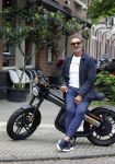 Amsterdam 1 augustus 2022
Ruud Gullit op zijn electrische Brekr scooter in Amsterdam zuid.