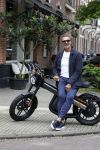 Amsterdam 1 augustus 2022
Ruud Gullit op zijn electrische Brekr scooter in Amsterdam zuid.