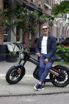 Amsterdam 1 augustus 2022
Ruud Gullit op zijn electrische Brekr scooter in Amsterdam zuid.
