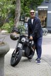 Amsterdam 1 augustus 2022
Ruud Gullit op zijn electrische Brekr scooter in Amsterdam zuid.