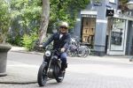 Amsterdam 1 augustus 2022
Ruud Gullit op zijn electrische Brekr scooter in Amsterdam zuid.