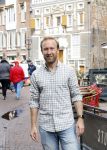 Haarlem 3 augustus 2023
Raymond Mens met zijn hond in het centrum van Haarlem .