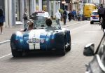Amsterdam 21 augustus 2024
Prins Bernhard en zijn zoon in zijn Shelby Cobra op de pc hooftstraat. Bernhard heeft een sleutelhanger ( bier opener) met daarop Heineken en het circuit Zandvoort.