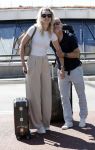 Schiphol 10 augustus 2024
Rob Kamphues en vriendin Kristi Nieuwenhuijse vertrekken vanaf schiphol voor hun vakantie naar Noorwegen.