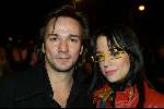 Amsterdam 2 december 2003
Premiere West Side Story in Carre. 
Spiros met vriendin