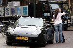 Amsterdam 17 september 2004
Carmen Rijkaard met porsche 911 cabrio op de Cornelis Schuytstraat